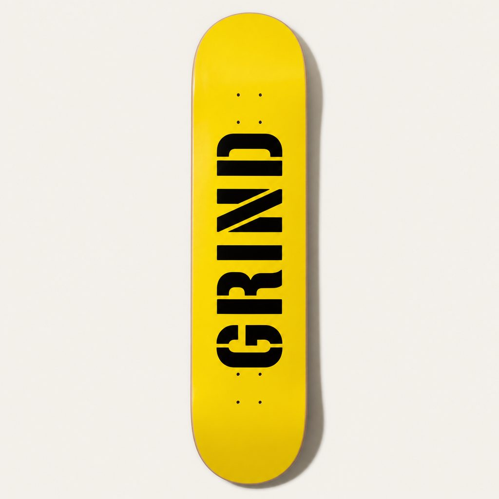 デッキ 7.75 の裏面。黄のグラフィックに GRIND の文字