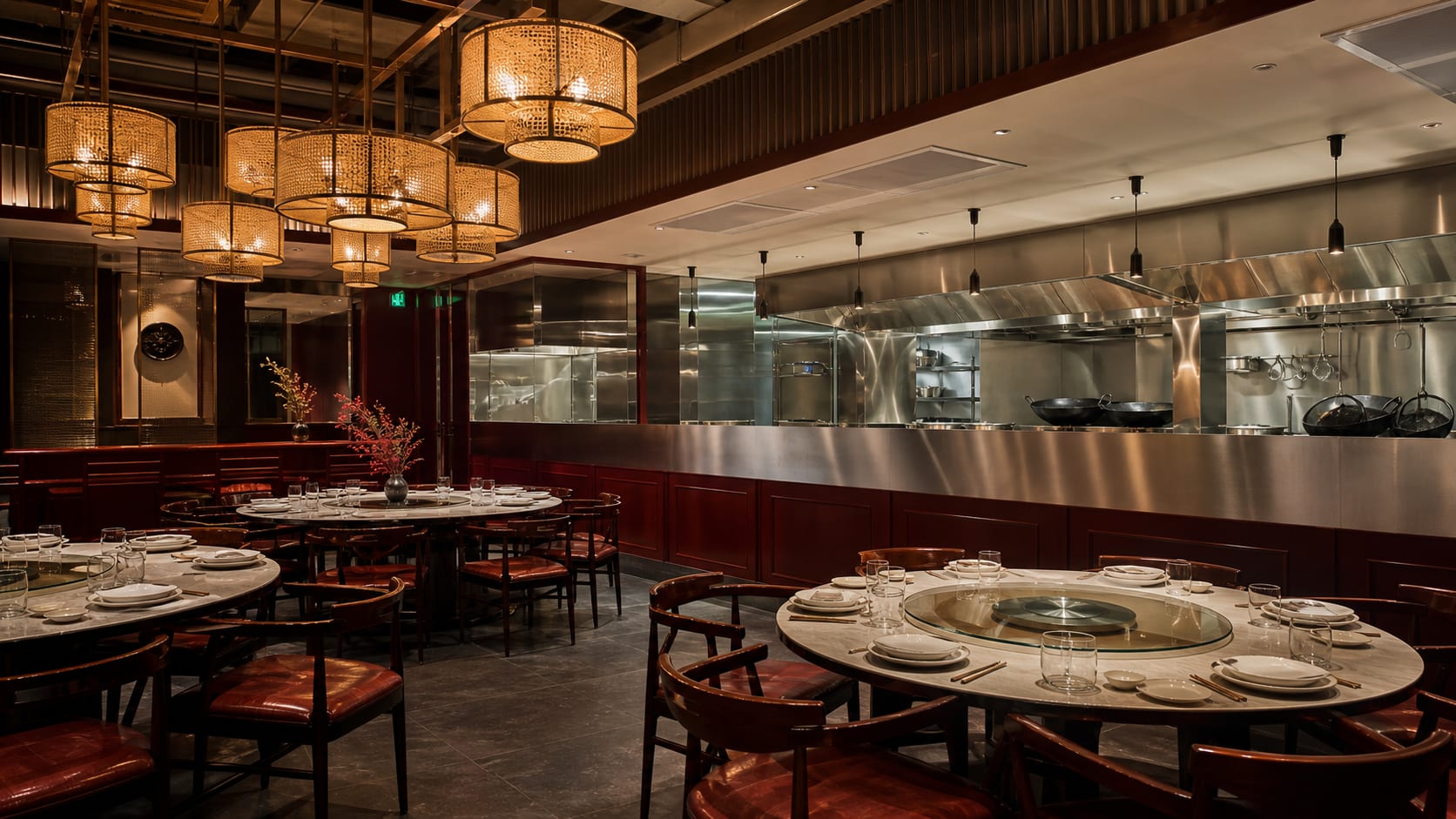 Hi to Nabe. A brushed stainless partition holding the wok range heat back from forty seats